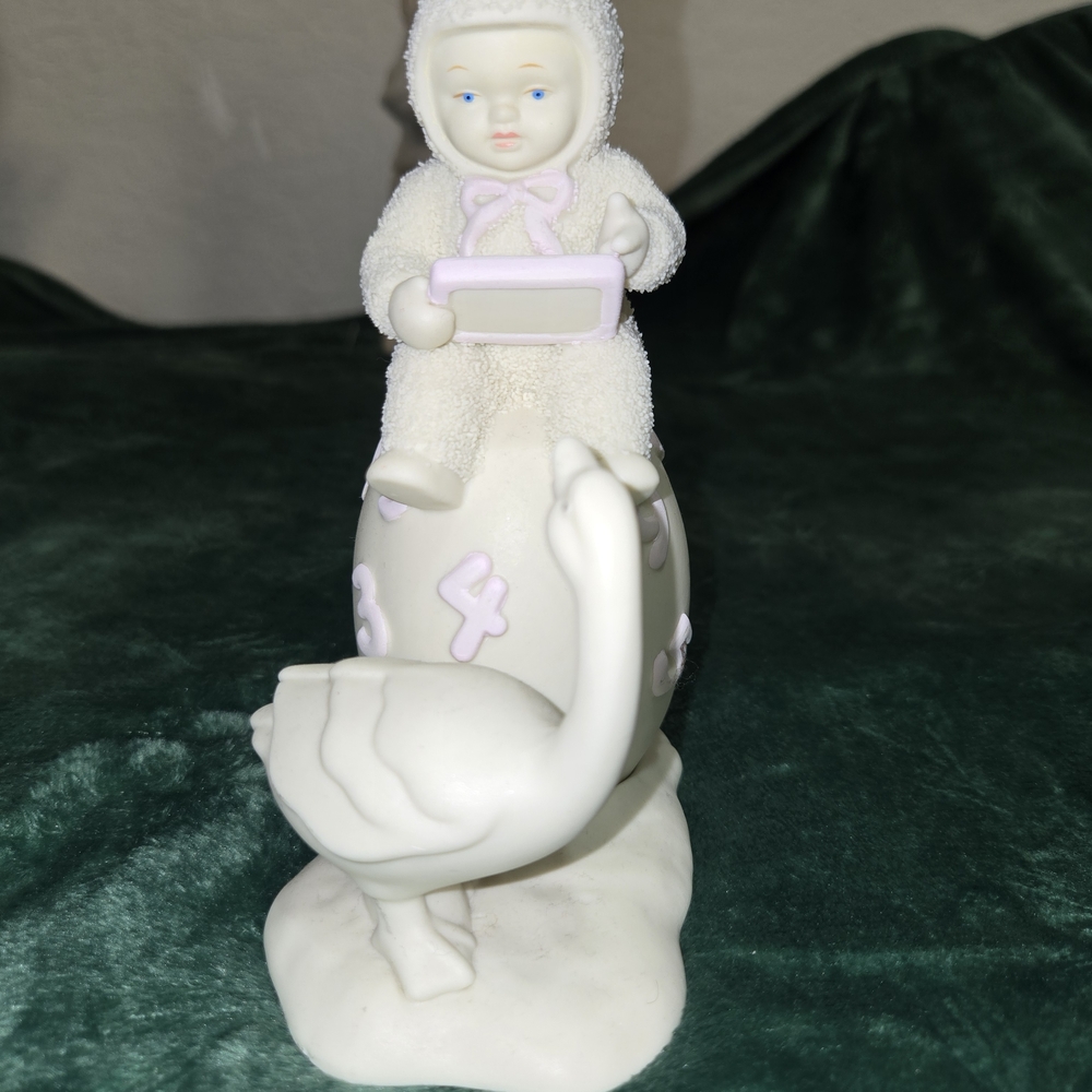 Porcelain Figurine with Child and Swan